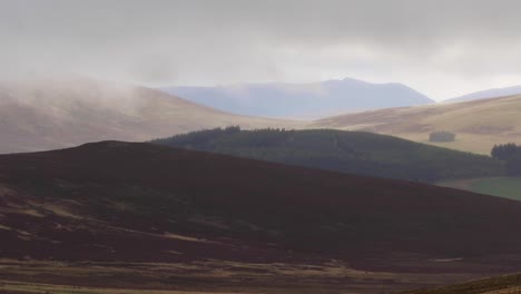 Scottish-mountain-scene-of-glen-during-stormy-weather-in-the-cairngorms-NP-during-October,-autumn.