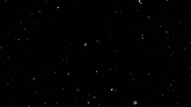 Weißer-Schnee,-der-auf-schwarzem-Hintergrund-isoliert