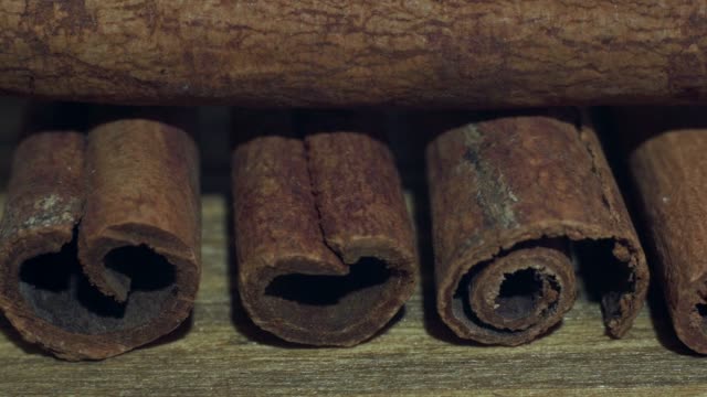 cinnamon-sticks-on-a-wooden-table.-4k