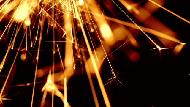 4K---Firework-sparkler-burning-background