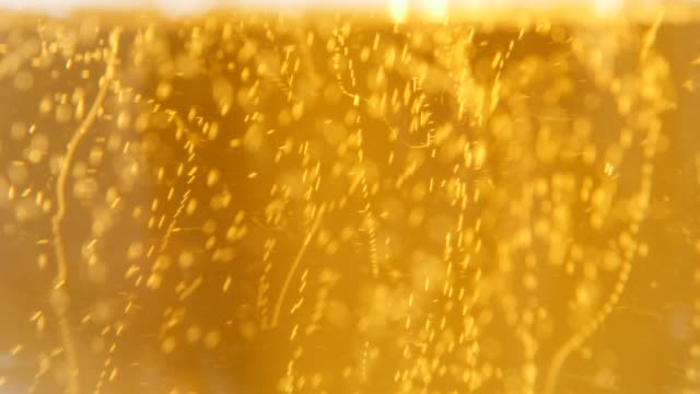 Full-glass-of-beer-bubbles-close-up-4K