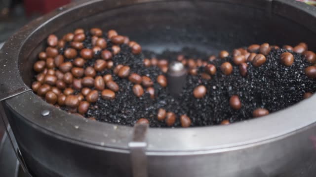 Slow-Motion-cooking-roasted-chestnuts-in-Thailand