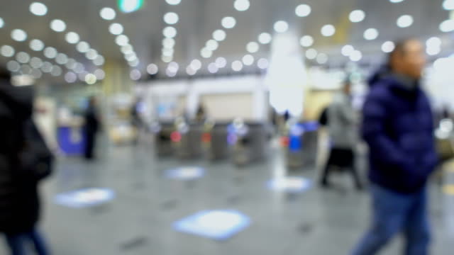 Blurred-passenger-and-Ticket-gate