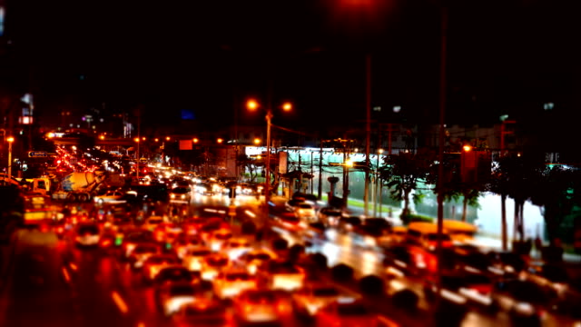 Abstract-blurred-traffic-jam-at-Rama-IV-road