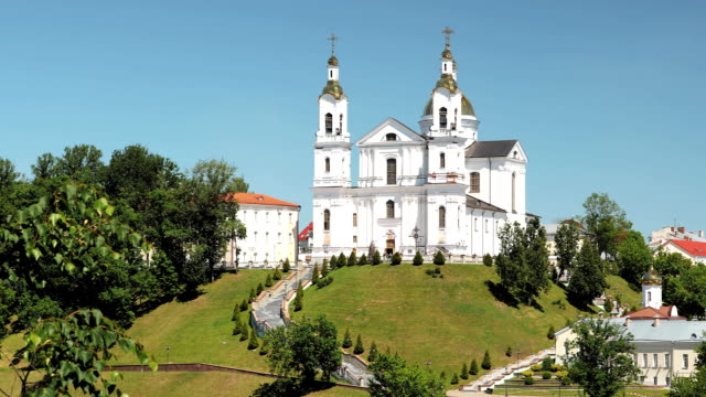 Vitebsk,-Belarus.-Assumption-Cathedral-Church,-Town-Hall,-Church-Of-Resurrection-Of-Christ-And-Dvina-River-In-Sunny-Summer-Day.-Pan,-Panorama