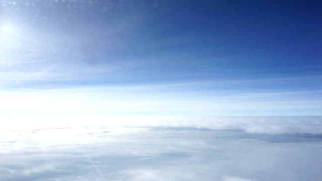 In-flight-flying-above-the-clouds
