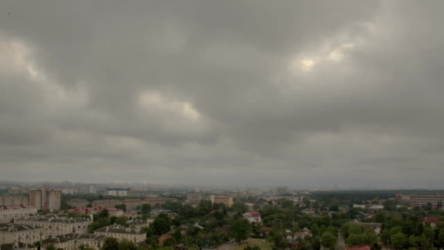 Storm-clouds-moving-above-city-time-lapse