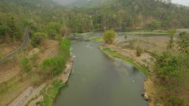 tropical-landscape-river,-farmers-land