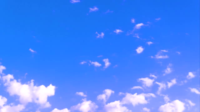 Time-lapse-white-clouds-over-blue-sky