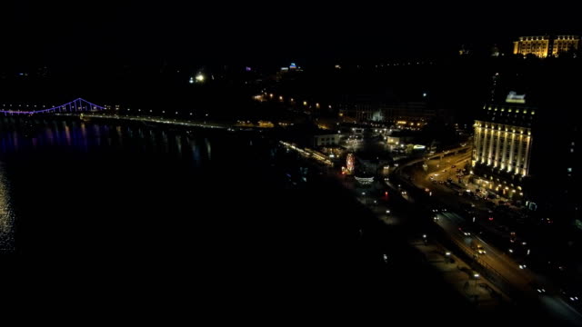 Aerial-view-from-Drone:-Top-view-of-the-night-promenade-with-bridges-and-cars.