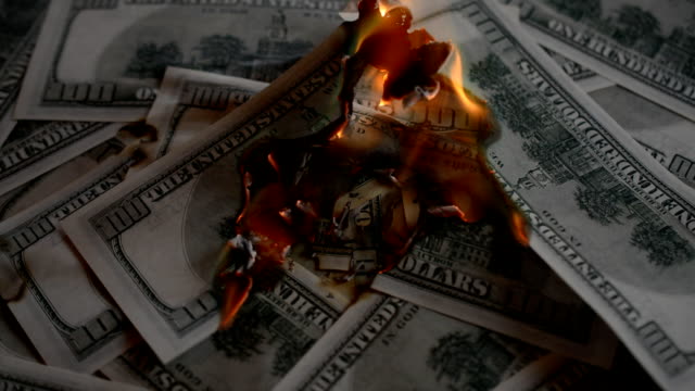 Dollar-bill-USA-money-burning-in-flames