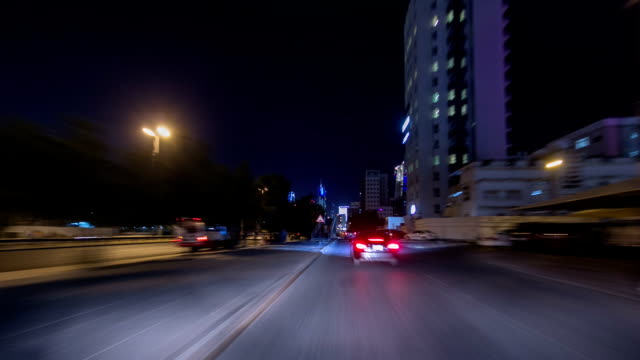 Drive-through-the-traffic-in-the-city-highway-timelapse-hyperlapse-in-Kuwait.-Kuwait,-Middle-East