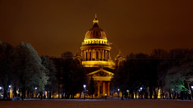 Winter-night,-Saint-Isaac's-Cathedral-against-dark-park,-view-from-Senate-Square