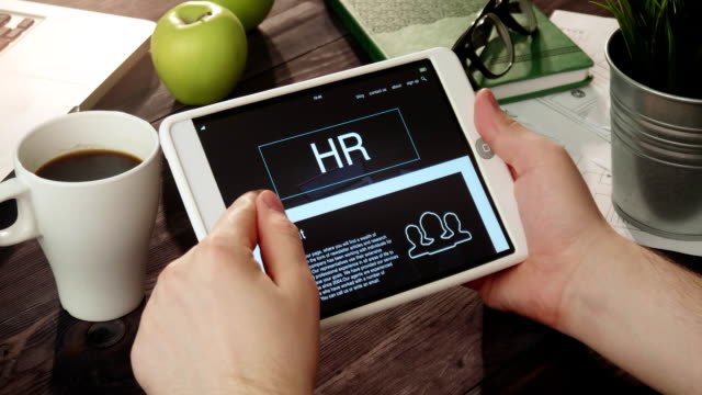 Reading-hr-internet-page-using-digital-tablet