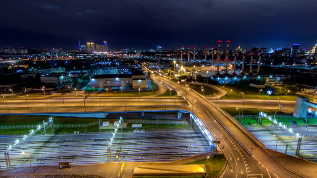 Moscow-timelapse,-night-view-of-the-third-transport-ring-and-the-central-part-of-Moscow's-rings,-traffic,-car-lights