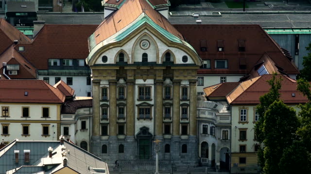 Holy-Trinity-Parish-Church-in-Ljubljana,-religion-and-tourism,-arial-view