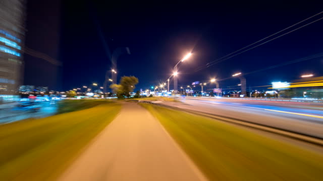 The-walk-in-the-beautiful-night-city.-time-lapse