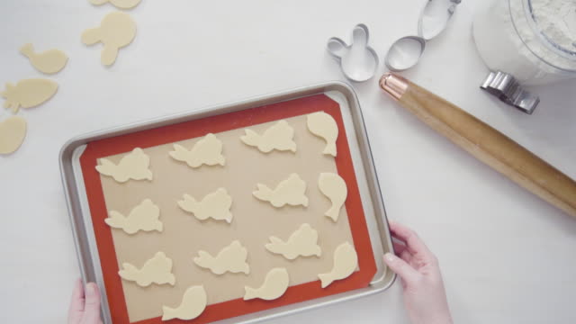 Unbaked-Easter-sugar-cookies-arranged-for-baking-on-a-baking-sheet.