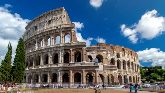 The-Colosseum-or-Coliseum-timelapse-hyperlapse,-also-known-as-the-Flavian-Amphitheatre-in-Rome,-Italy