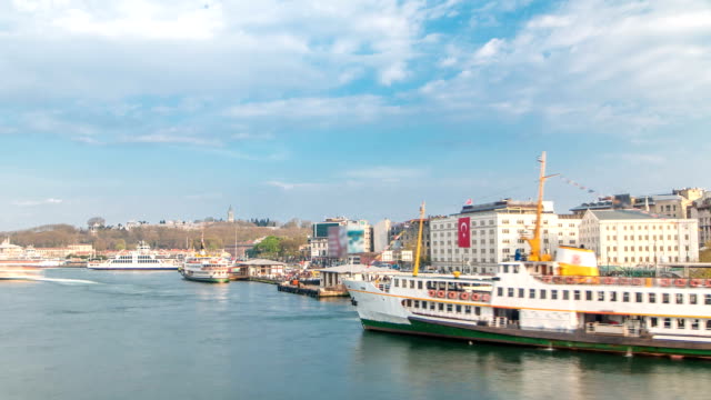 Tourist-ship-and-ferris-traffic-on-Bosphorus-timelapse-view-from-Galata-Bridge-in-Istanbul,-Turkey