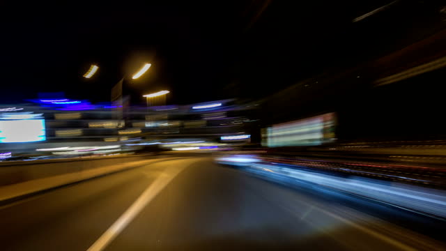 Monaco-city-roads-traffic-at-night-with-car-light-trails-timelapse-hyperlapse-drivelapse