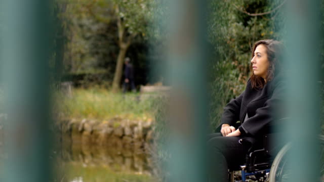 disability,-sadness,-loneliness-sad-woman-on-wheelchair-contemplating-nature