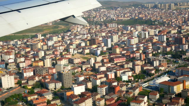 Fenster-Flugzeug-Stadt