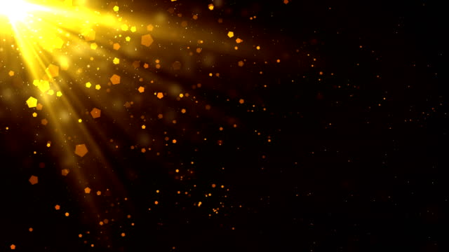 Las-partículas-de-los-rayos-de-luz-dorada