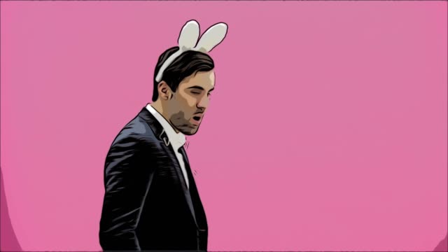 Young,-beautiful,-couple,-standing,-pink,-background.,-With,-hackneyed,-ears,-head.,-During,-this,-man,-his,-wife,-are,-looking,-into,-camera.,-Having,-lifted,-Easter,-basket,-look,-him,-kissed,-gently,-smiling.-Easter.-Animation.