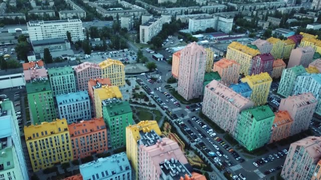 Top-view-of-the-colorful-buildings,-aerial-footage-from-the-drone-on-Comfort-Town.-Residential-district-in-Kiev