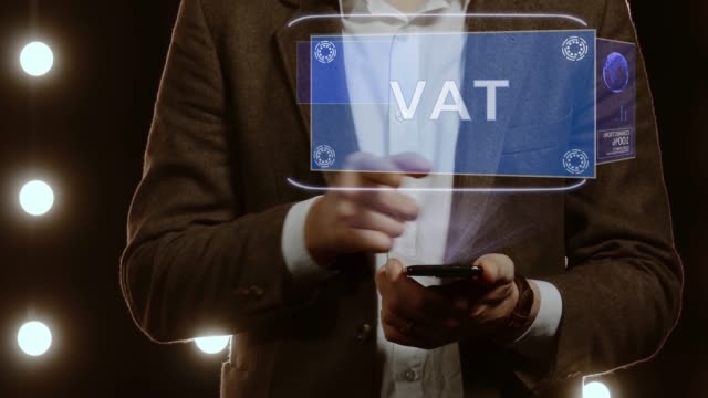 Businessman-shows-hologram-VAT