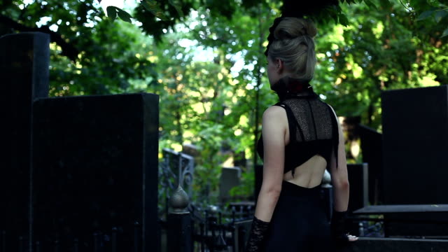Terrible-girl-at-the-cemetery.-She-pulls-her-hands-to-us.