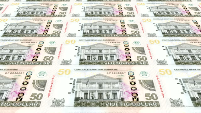 Billetes-de-cincuenta-dólares-surinameses-de-Suriname,-dinero-en-efectivo,-lazo