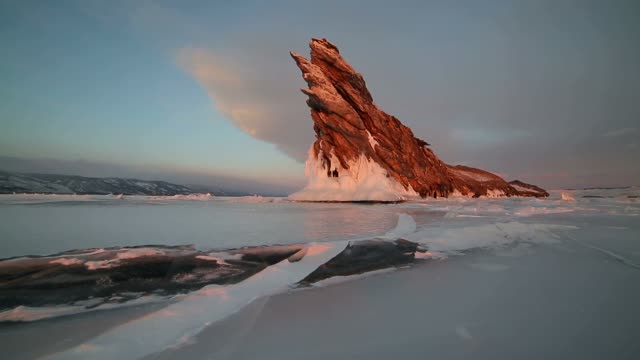 The-extremity-of-Ogo-island-in-winter-at-sunset-in-motion