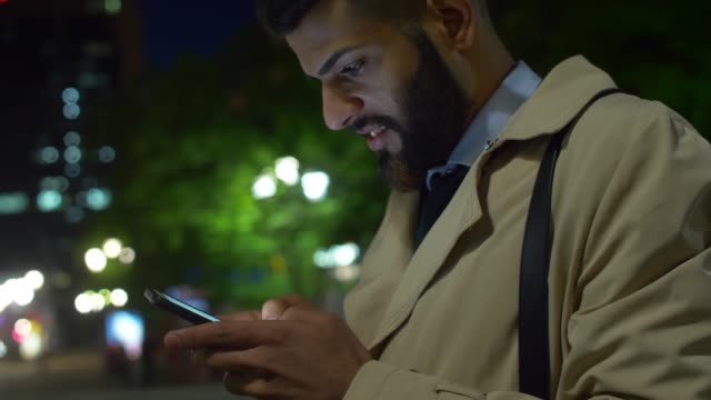 Arabian-businessman-texting-and-answering-questions-in-his-blog