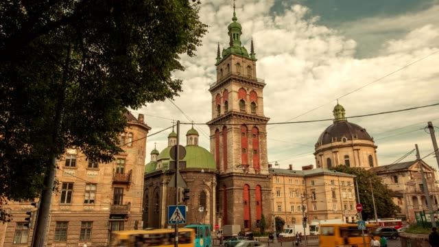 Time-lapse-of-moving-clouds-over-the-church-in-city-Lviv,-Ukraine.-Central-part-of-old-city.-European-City.-Densely-populated-areas-of-the-city.-Ukraine-Dominican