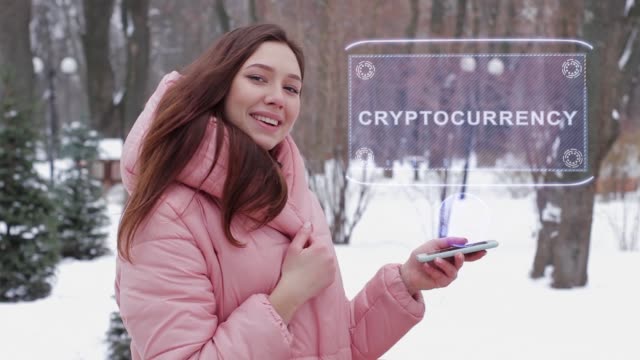 Rothaariges-Mädchen-mit-Hologramm-Cryptocurrency