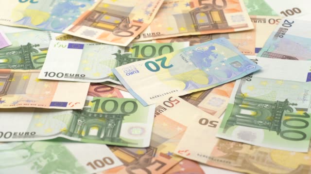 4K-Dolly-sliding-shot-euros-bills-of-different-values.-Euro-cash-money