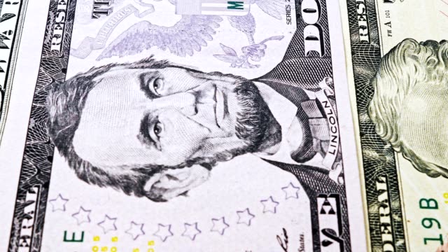 Slide-video-bills-from-one-to-ten-US-dollars-with-portraits-of-US-presidents.