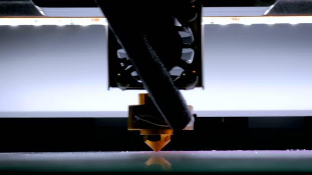 Modern-3D-printer-machine-printing-plastic-model