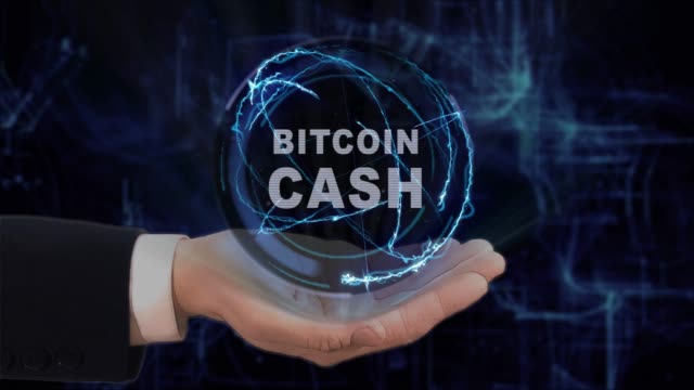 Painted-hand-shows-concept-hologram-Bitcoin-cash-on-his-hand