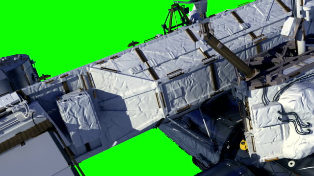 Flight-Of-The-International-Space-Station-On-Green-Screen.