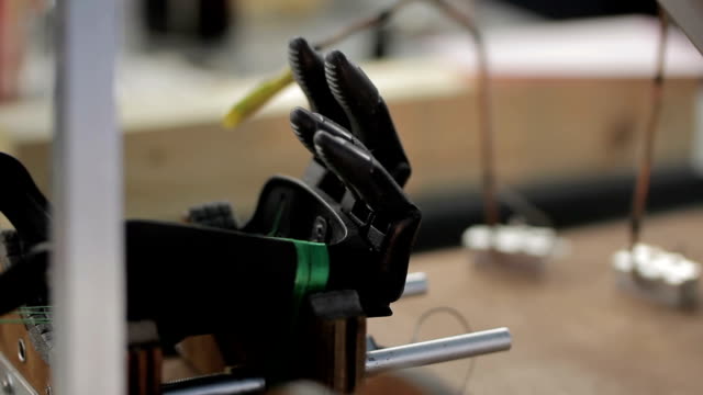 Close-up-of-artificial-hand-limb-is-being-tested