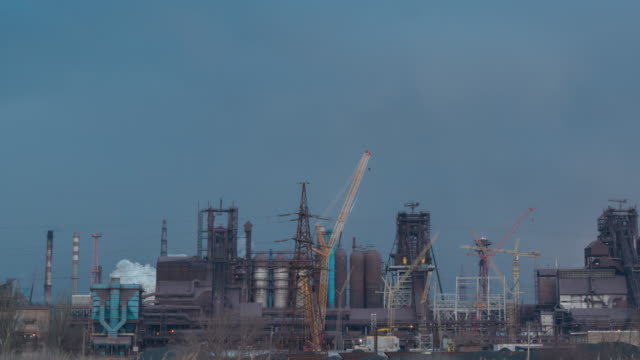 Industry-factory-at-the-cloudy-time.-Timelapse-4K