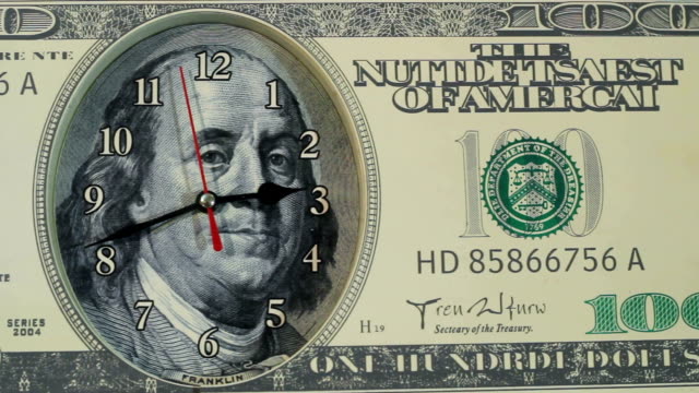 Time-is-money.The-clock-on-the-hundred-dollar-bill.