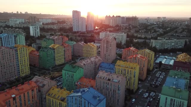 Colorful-buildings-of-a-residential-district,-aerial-shooting-from-a-drone-on-Comfort-Town.-Kiev,-Ukraine