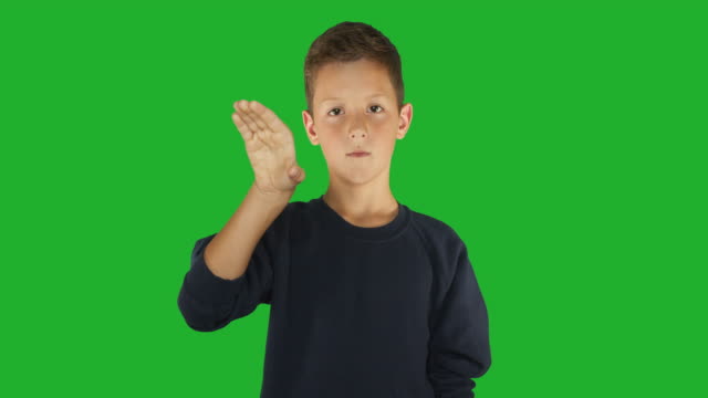 Deaf-boy-signing-I-know-sign-language,-communication-for-hearing-impaired.-Green-screen