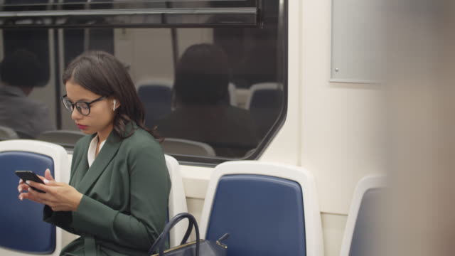 Woman-in-Subway-Car