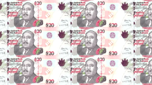 Banknotes-of-twenty-bahamians-dollars-rolling-on-screen,-cash-money,-loop