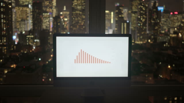 Finanzielle-Computing-mit-Diagrammen-und-Grafiken.-Moderne-Office-Hintergrund-mit-Skyline-der-Stadt